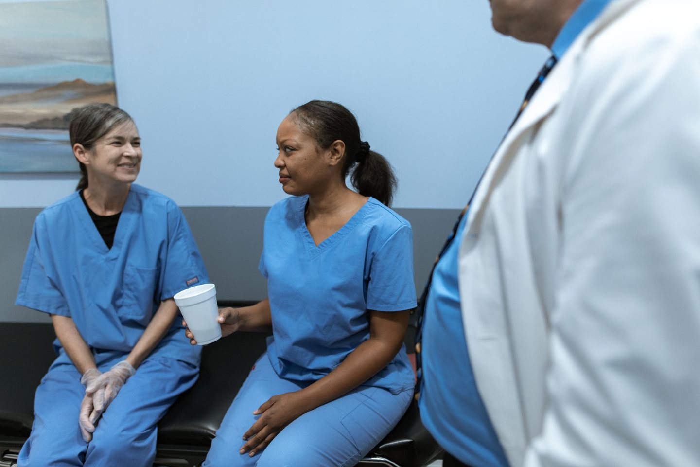 Healthcare professionals discussing their work together